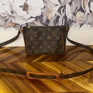 Authentic Louis Vuitton Viva Cite PM in monogram.